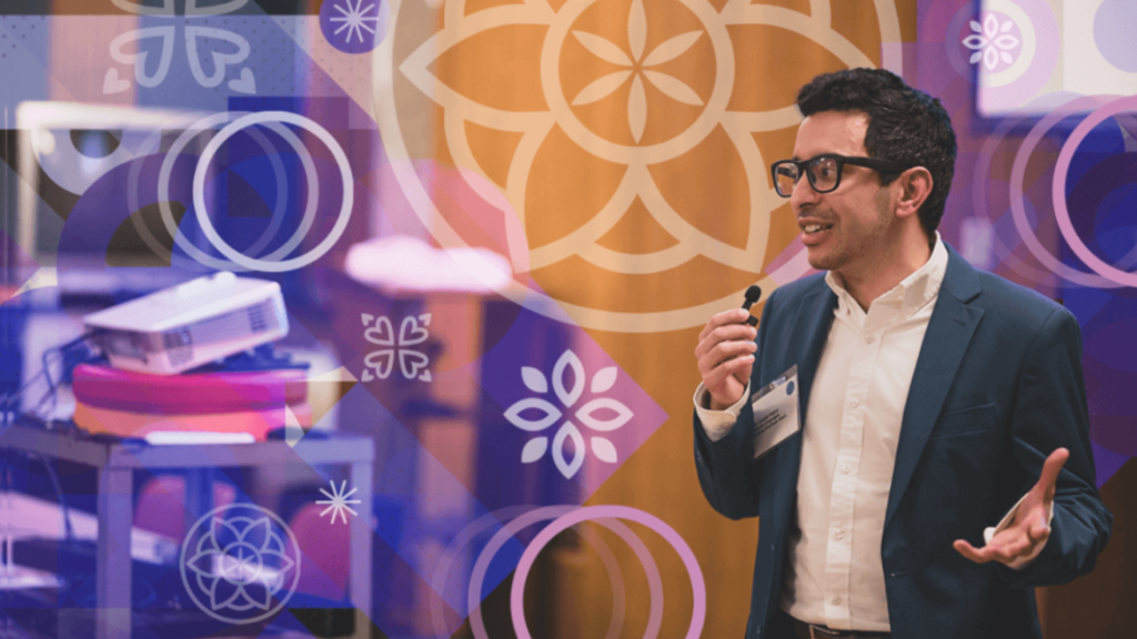 Rosetta Languages' Danyal Najmi presenting at the 2023 Asian Business Pitch Contest in Malden, Massachusetts.
